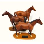 Three Beswick Connoisseur models of race horses; 'Nijinksky', no. 2345, 27.5cm high; 'The Minstrel',