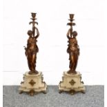 Pair of late 19th Century French gilt spelter clock garniture female figure candlesticks, on gilt