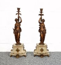 Pair of late 19th Century French gilt spelter clock garniture female figure candlesticks, on gilt