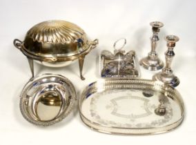 Silver plated revolving oval breakfast dish, W.34cm; pair of candlesticks, sandwich stand, oval