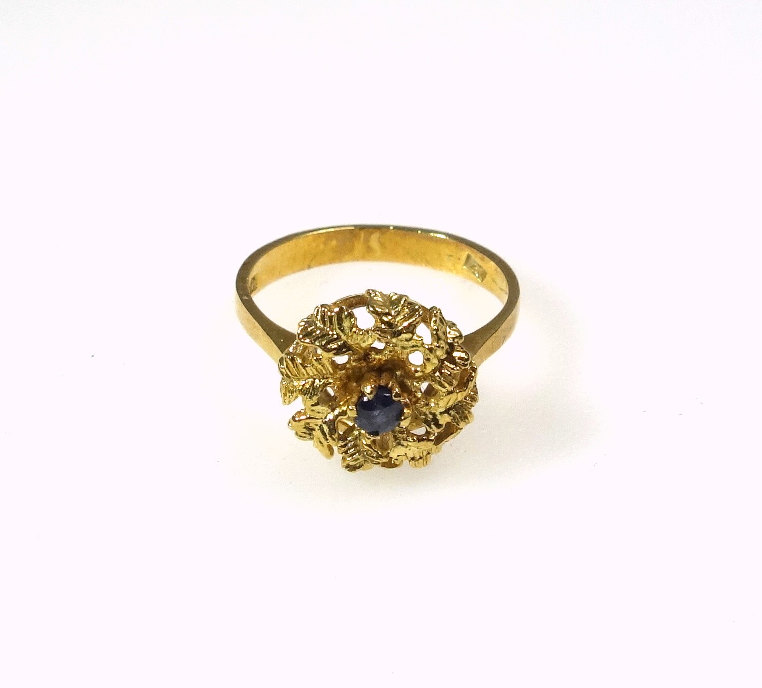 Foreign yellow metal ring with a sapphire in a floral setting, stamped 18k, 5grs, cased. (2) - Image 2 of 5