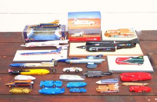 Collection of 25 models of land speed record cars, including Donald Campbell's Bluebirds, Bloodhound