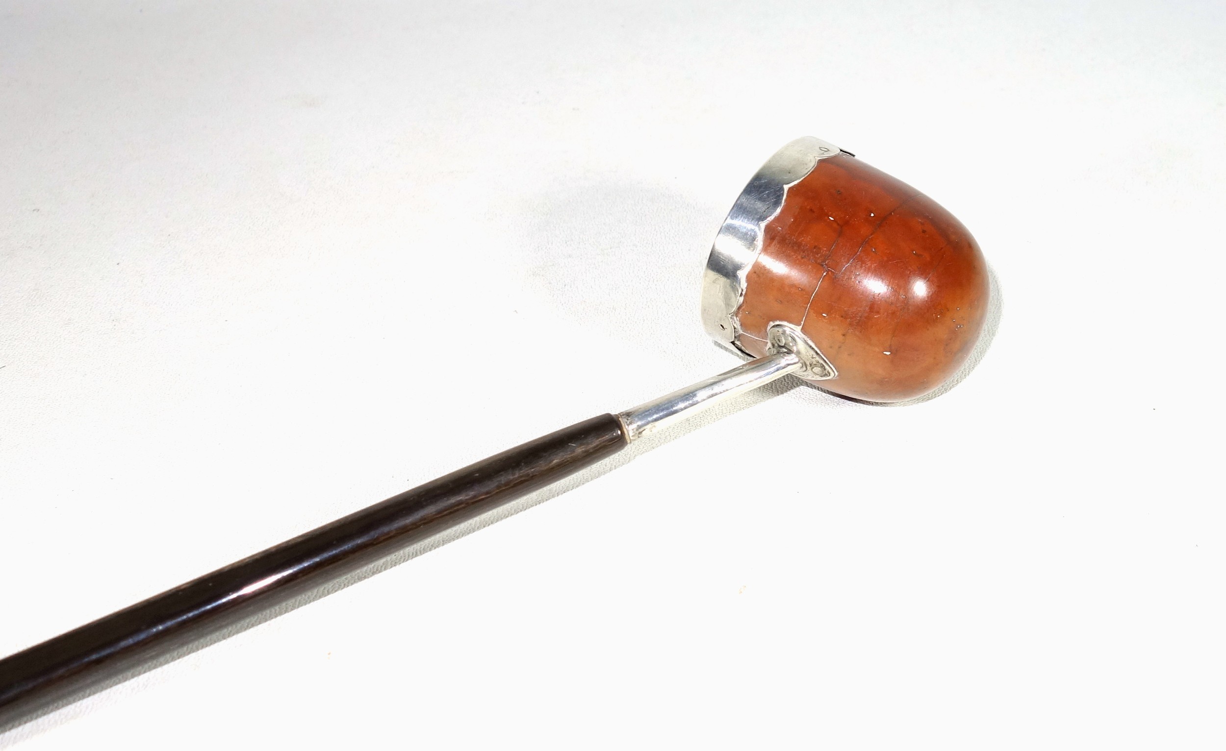 Georgian toddy ladle with a coquilla nut bowl and silver mounted rim, on a twisted whalebone handle, - Image 3 of 4
