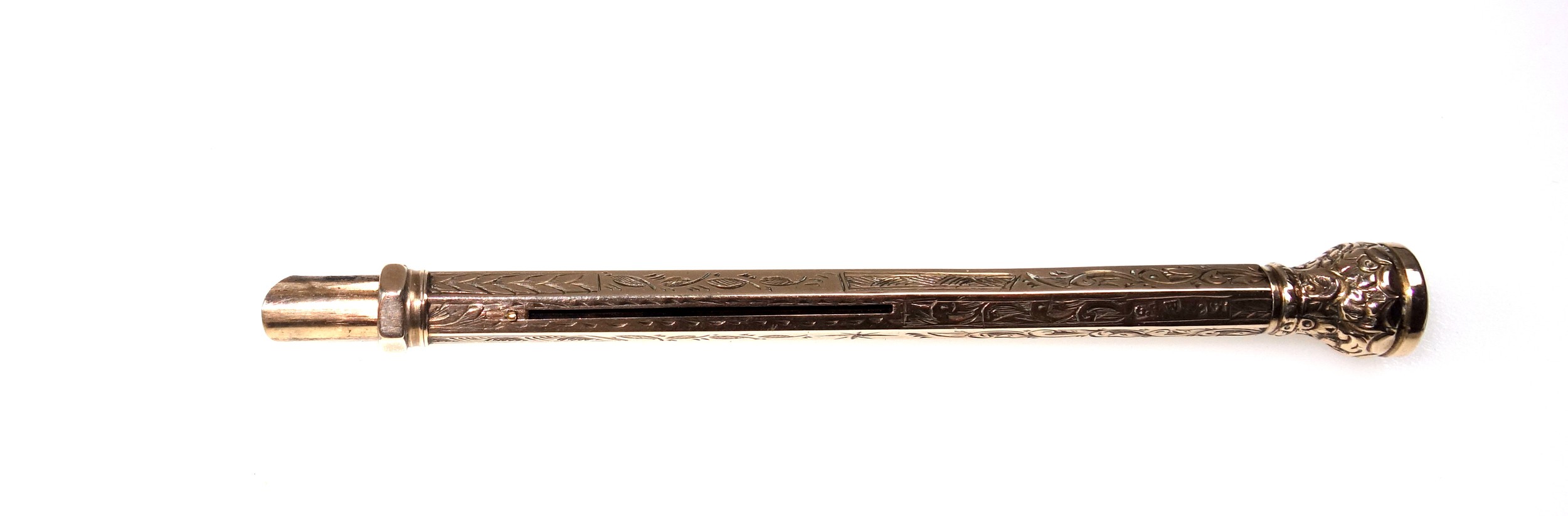 Early 20th Century 9ct gold hexagonal propelling pencil with chased foliate and scroll decoration - Image 4 of 5