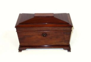 Victorian mahogany tea caddy of sarcophagus form, the interior with 2 removable boxes flanking a