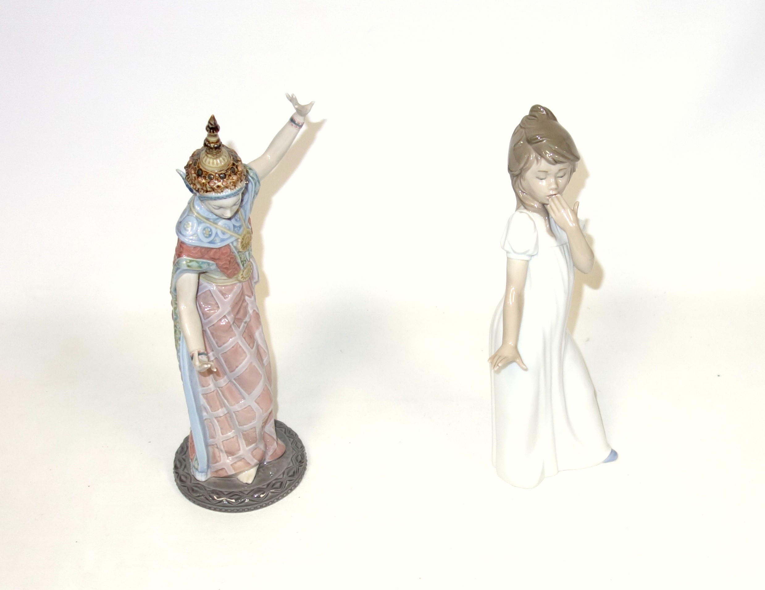 Lladro figure of a female Thai dancer, model No.5593, H.33cm, and a Nao figure of a girl, H.29cm. - Image 4 of 5