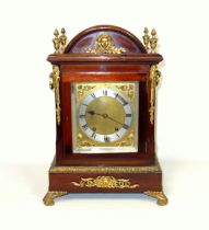 Edwardian Regency style mantel clock with a brass dial, silvered chapter ring and Roman numerals