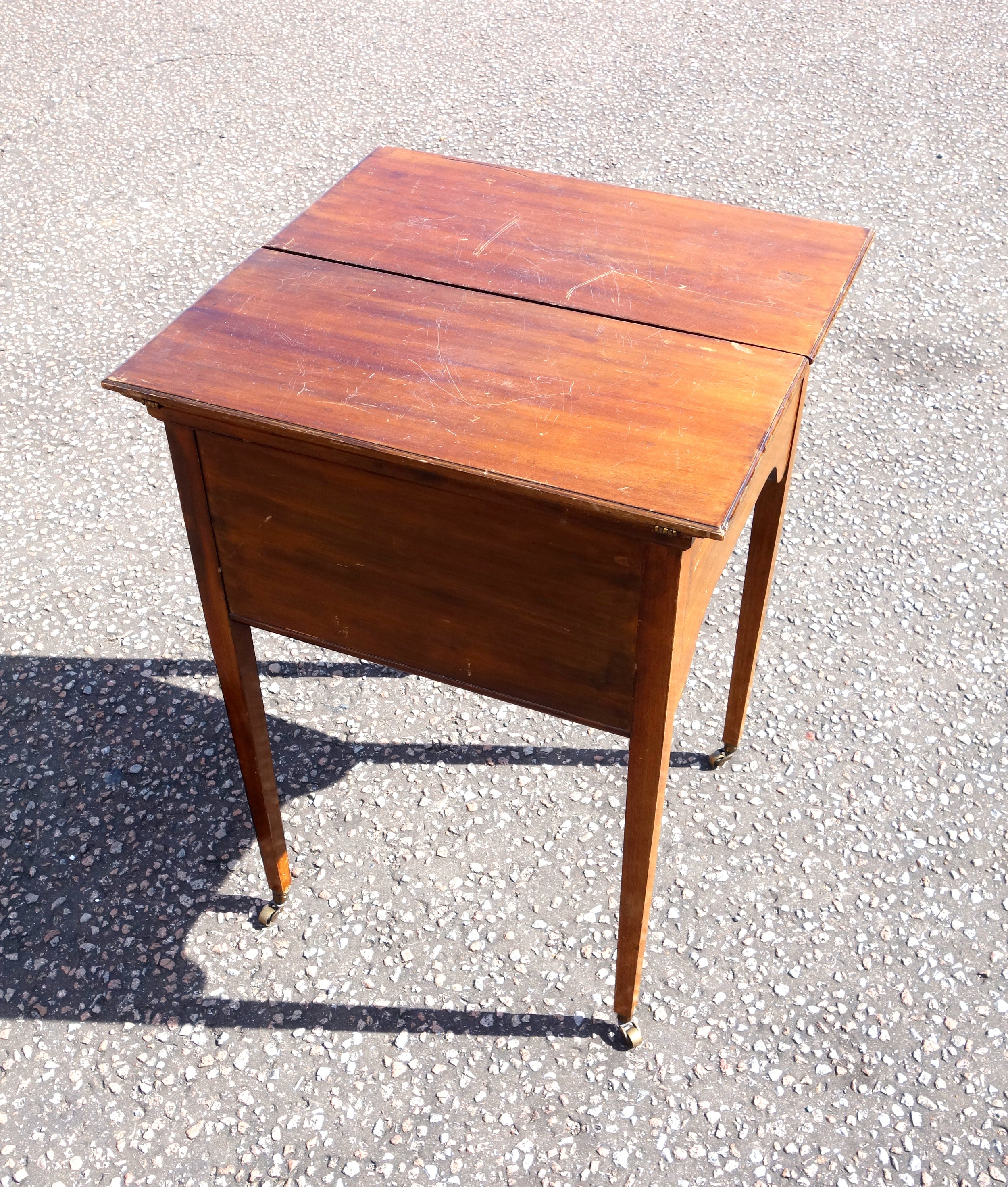 Edwardian Scottish mahogany writing table with a double hinged top raising a slope with pen tray, - Image 3 of 7
