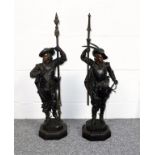 Pair of late 19th Century French spelter figures of soldiers, each with a pike, standing on an