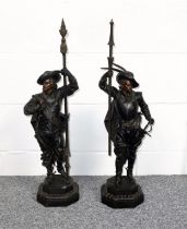 Pair of late 19th Century French spelter figures of soldiers, each with a pike, standing on an