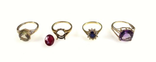 Yellow metal blue stone and white stone ring, 9ct gold citrine ring, 9ct amethyst ring, and a 9ct