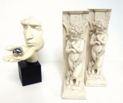 Two Diletantti cast stone cherub bookends titled Philosophus Parvus or Little Thinker, each 29cm