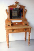 Late Victorian pine dressing table with a rectangular swing mirror with later light above, 2 small