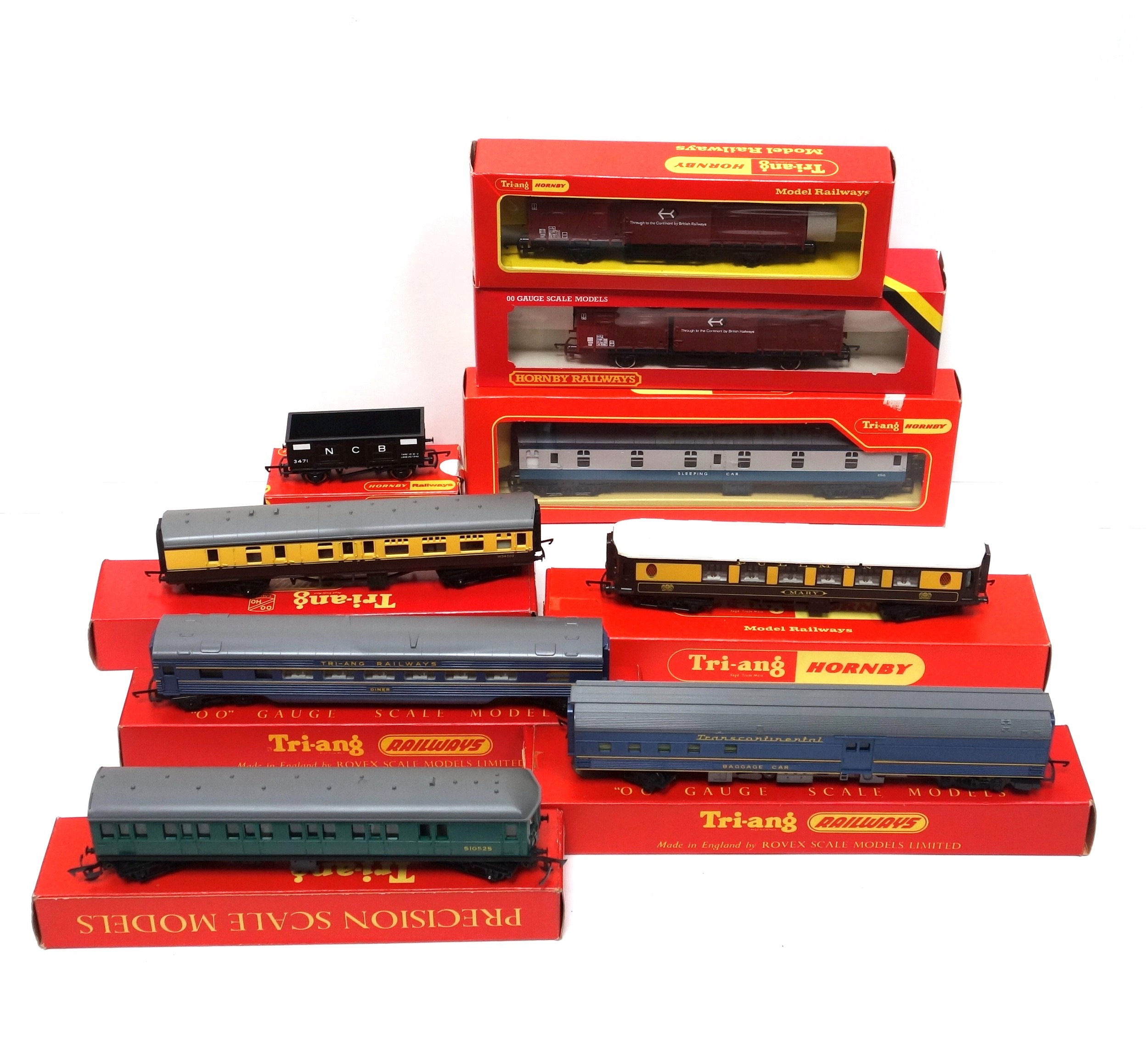 7 Tri-ang Hornby coaches, R.339, R.325, R.446, R.329, R.228, R.225, and R.102, and 2 wagons, R.