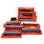 7 Tri-ang Hornby coaches, R.339, R.325, R.446, R.329, R.228, R.225, and R.102, and 2 wagons, R.