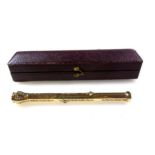Victorian yellow metal octagonal combined pen and pencil with engraved floral decoration and