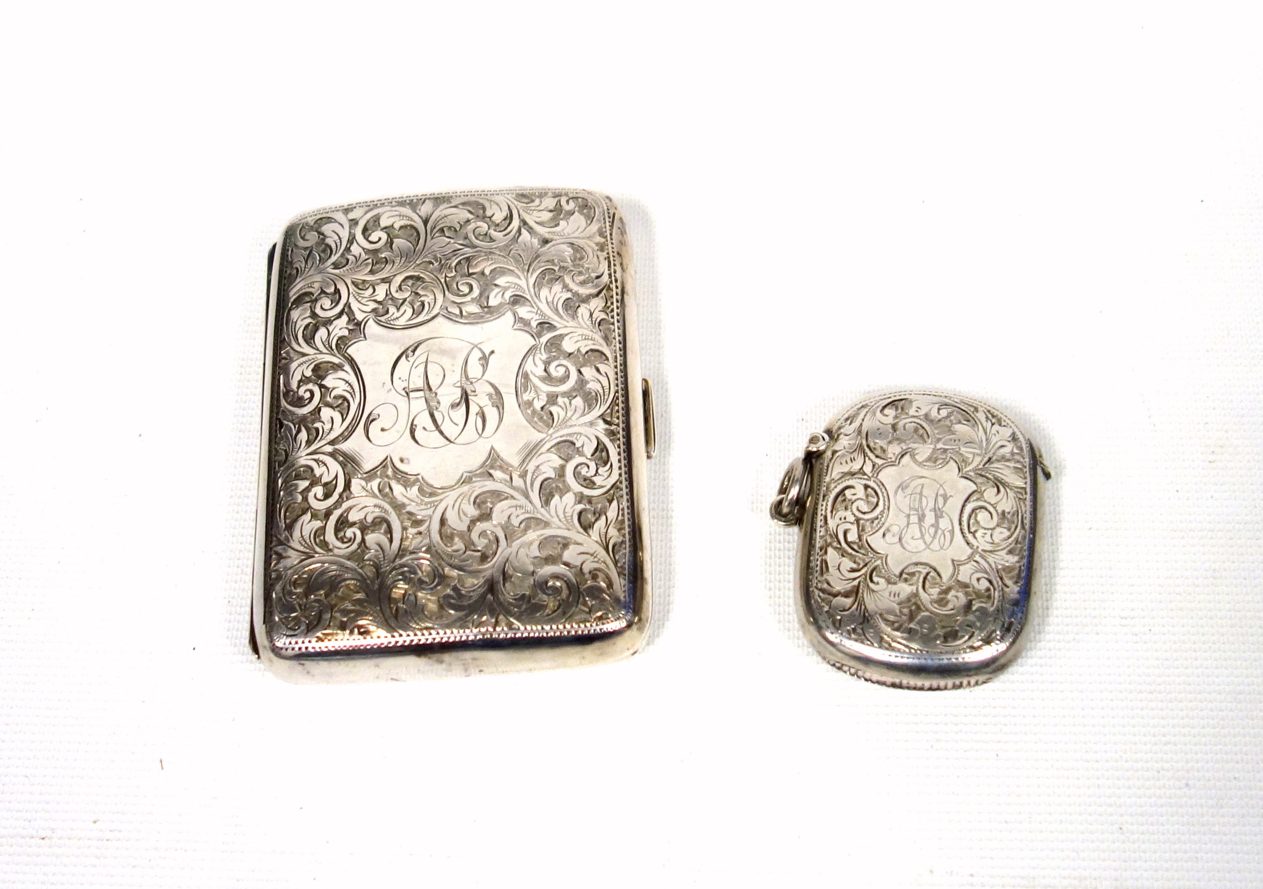 Edwardian lady's silver cigarette case chased all-over with scrolling foliate decoration, the hinged - Image 2 of 6