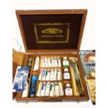 Windsor and Newton brass bound wooden artists paint and materials box, containing 20 tubes of oil