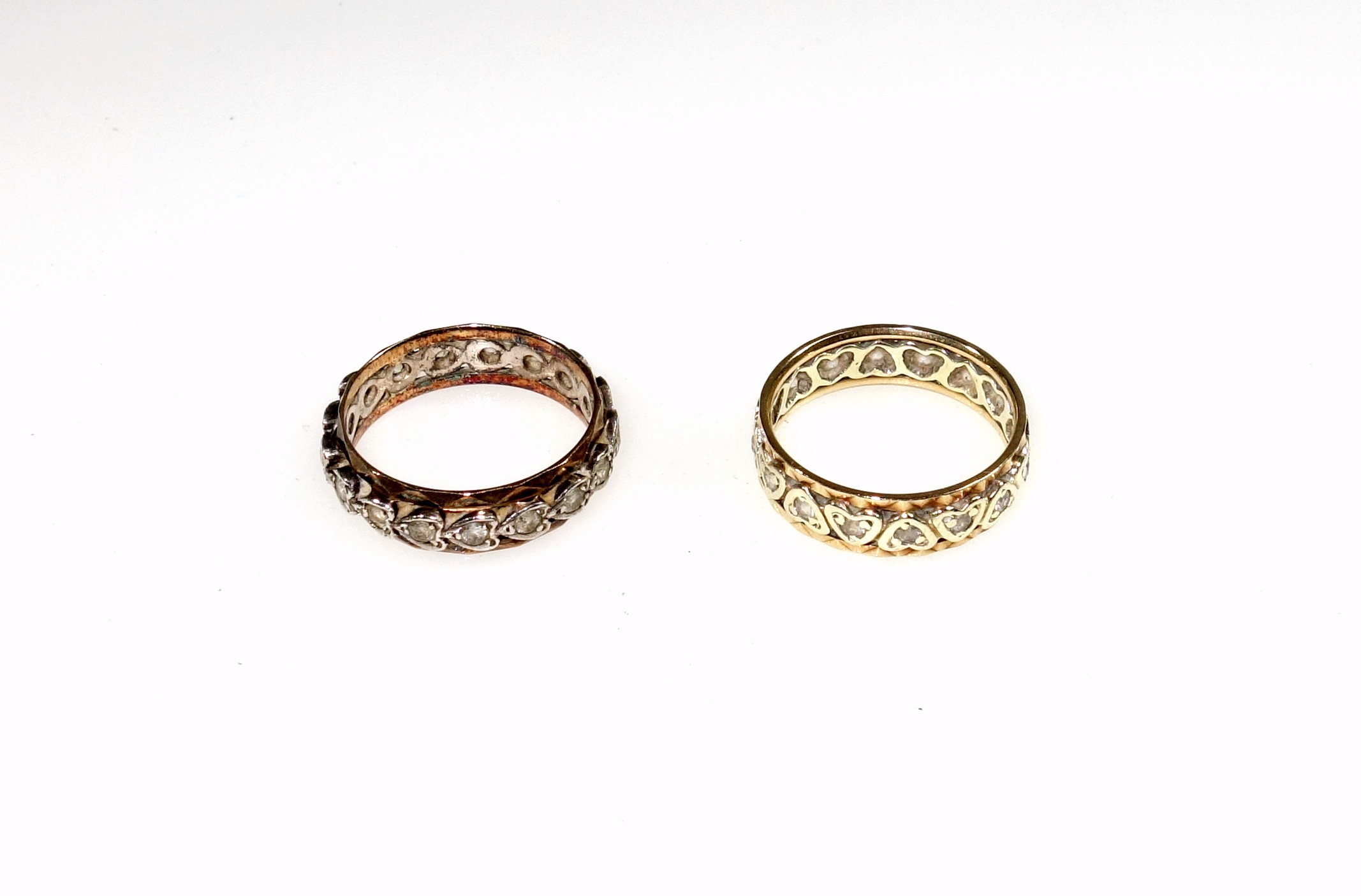 9ct gold faceted eternity ring set CZs in heart shaped settings, 3 grams and a similar ring