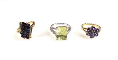 9ct gold triple row sapphire and diamond ring, 9ct blue stone cluster ring, and a 9ct citrine and