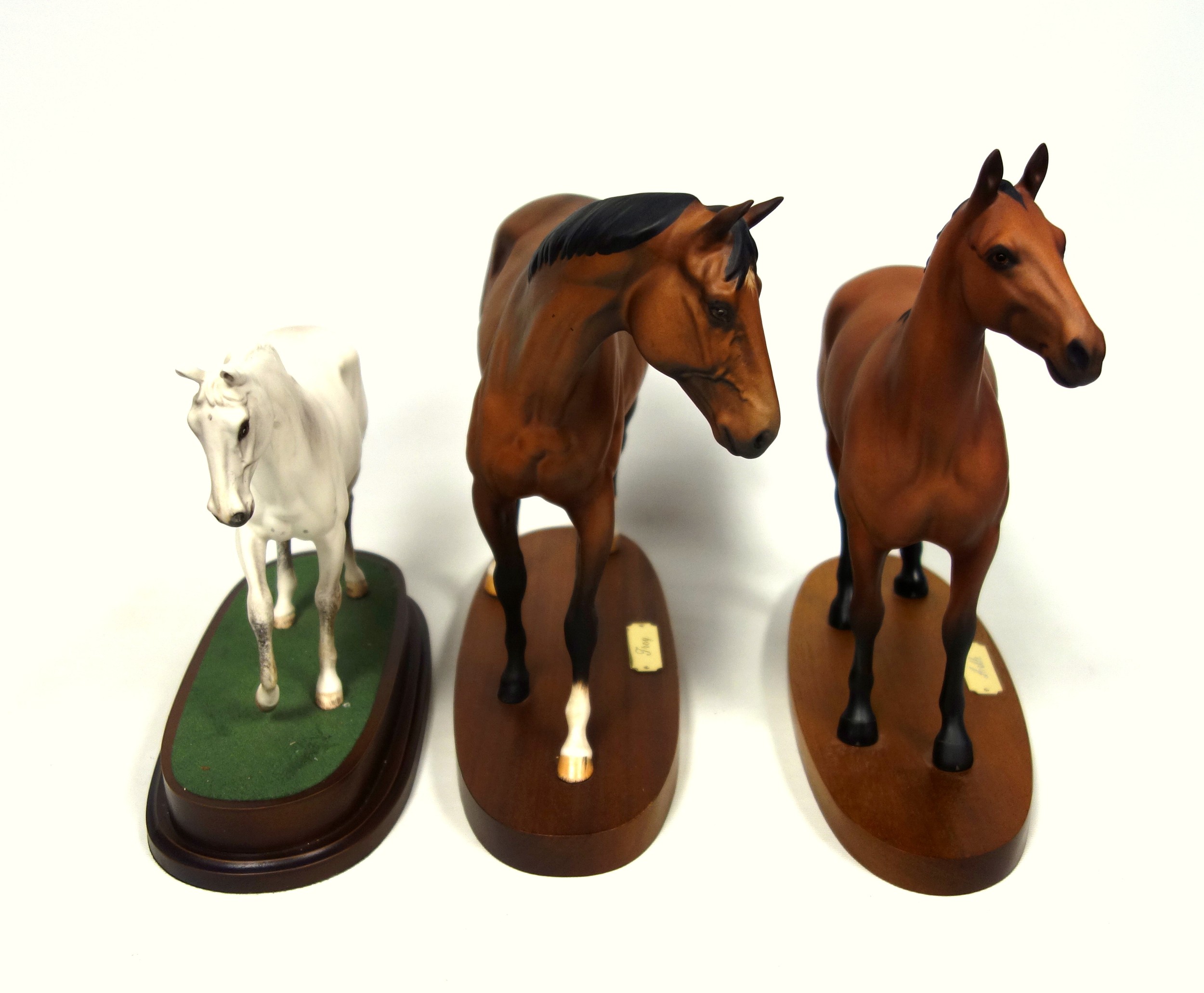 Three Royal Doulton models of race horses: 'Arkle', 30cm high; 'Troy', 28cm high; and 'Desert - Image 2 of 3