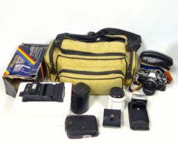 Olympus OM10 with 3 lenses, manual adaptor, flashgun and extension tubes, tripod and numerous out of