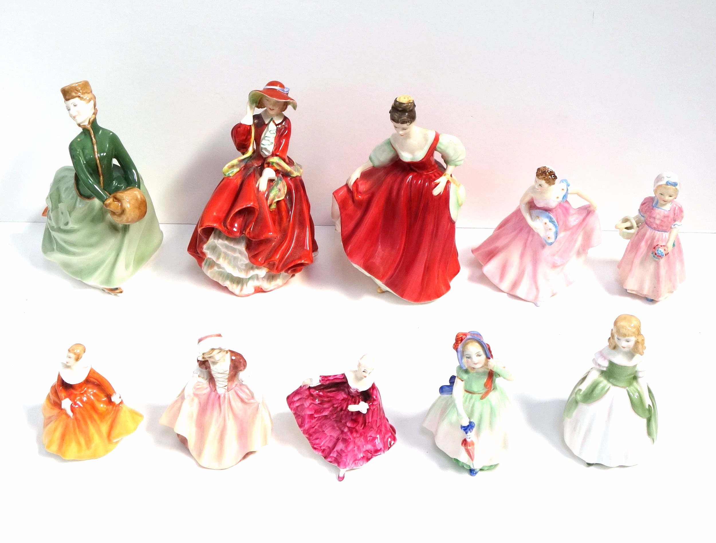 Royal Doulton figure Grace, HN 2318, H.19.5cm; Top o The Hill, HN 1834; Fair Lady, HN 2832, and 7