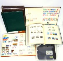 Three Windsor albums containing QEII stamps, 3 stock books with stamps, 4 albums of F D C's, from