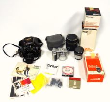 Canon AE1, 50mm 1.4 lens, Canon G6 digital, Vivitar 75 - 205 lens with converter and 2 tripods;