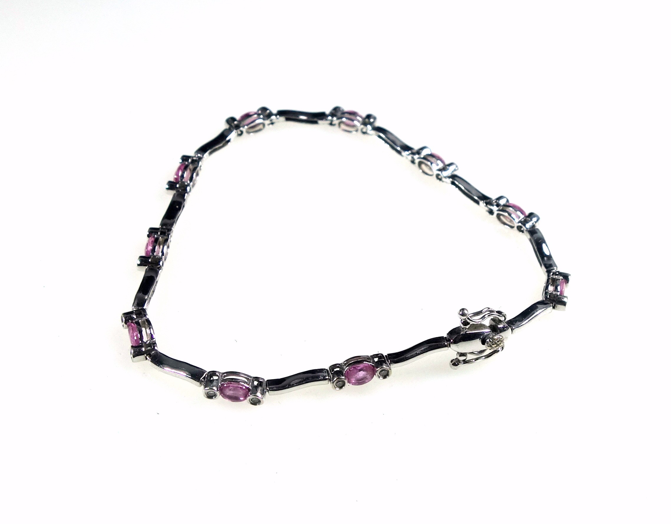 18ct white gold bracelet set with 20 brilliants and pale pink stones, L.18.5cm, gross 7.7grs, cased. - Image 4 of 4