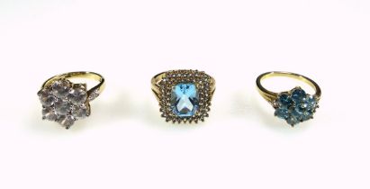 9ct gold cluster ring set white stones, 9ct blue cluster ring, and a 9ct ring set pale blue stone
