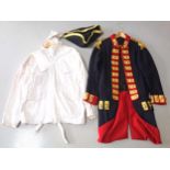 18th century style soldiers tunic, with red and gilt appliques and brass buttons, tricorn hat,