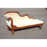 Victorian carved rosewood chaise longue upholstered in mushroom velour with a shaped back, on