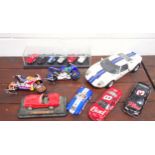 Motor Max 1:12 scale diecast model of a Ford GT, 2 Chevrolet NASCARs, one as a moneybox; 2 Maisto