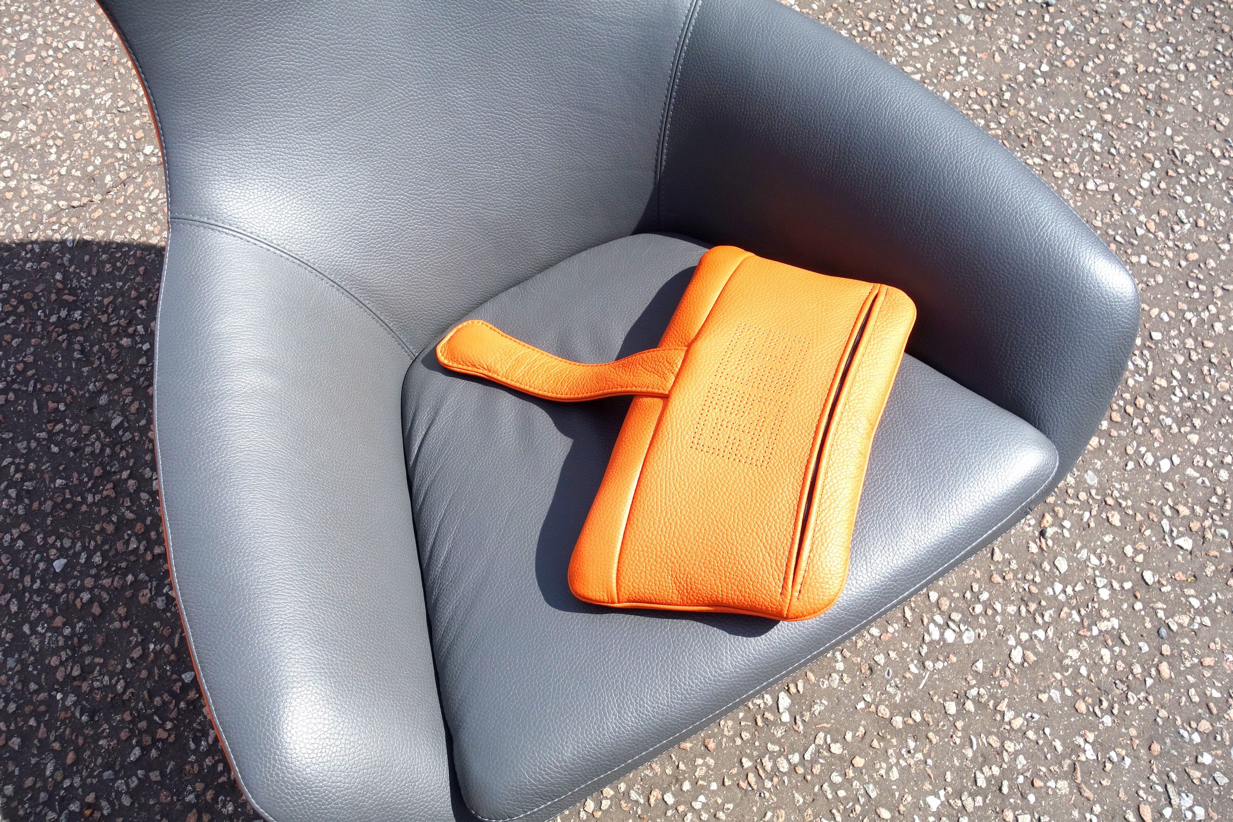 Leolux Caruzzo swivel armchair, designed by Hans Schrofer, launched 2015, custom made with orange - Image 5 of 6