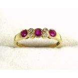 18k gold, ruby and diamond ring, size Q 1/2, set three rubies and four small diamonds, 2.4 grams