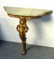 Victorian gilt moulded console table with floral decoration, and a green veined marble top, on a
