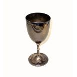 Large Edwardian silver goblet, of plain form with a beaded knopped stem and circular foot, by