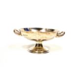 George V silver circular sweetmeat dish with 2 loop handles, on a pedestal foot, by William Hutton &