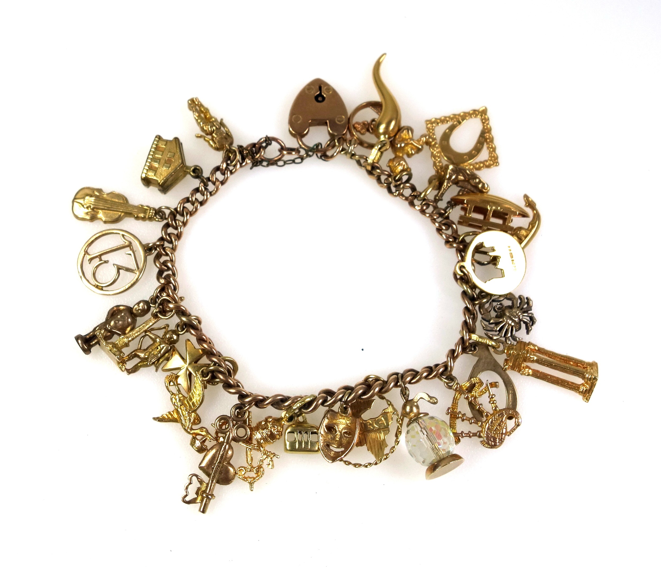9ct gold charm bracelet with 27 charms, gross weight 44.2 grams - Image 2 of 5
