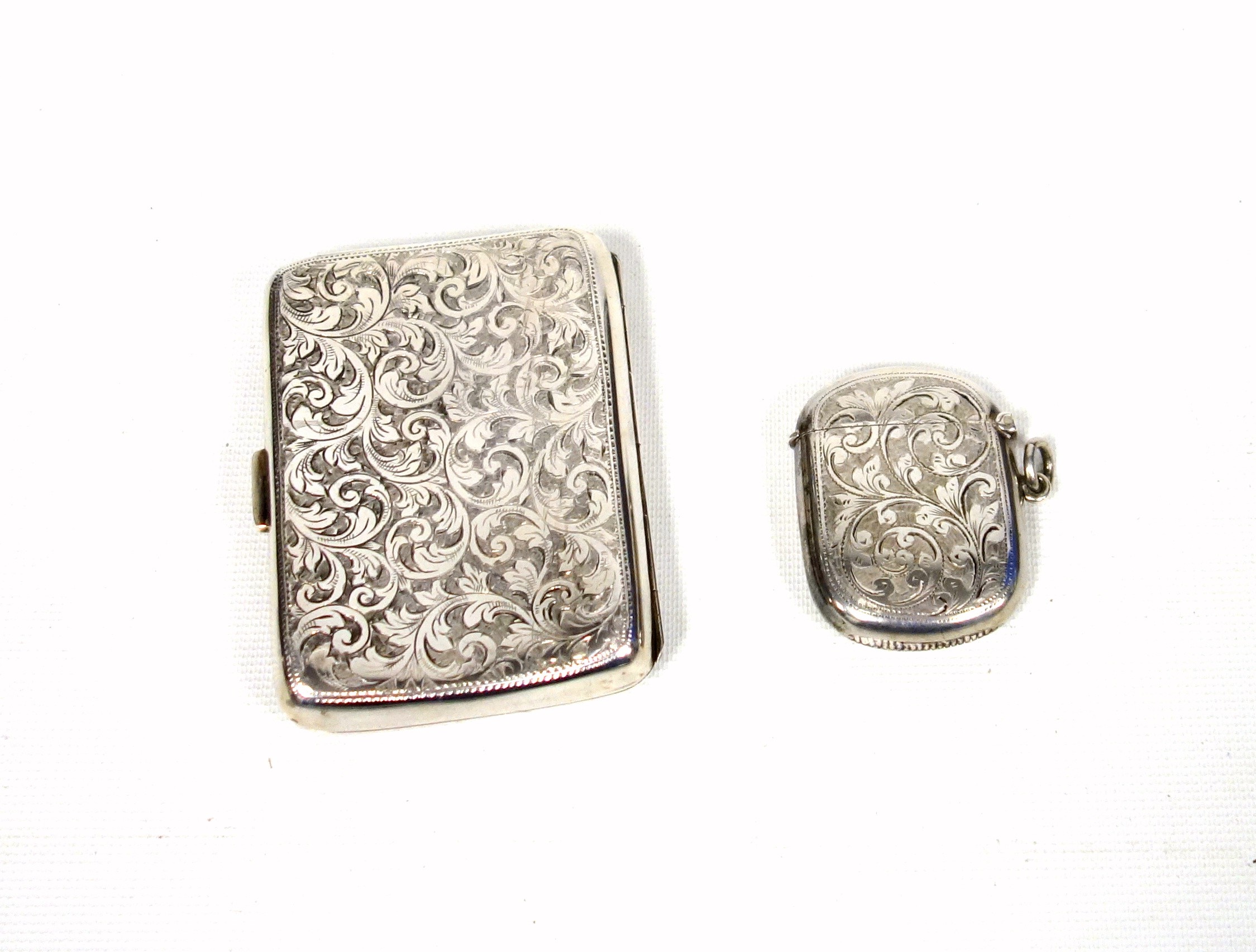 Edwardian lady's silver cigarette case chased all-over with scrolling foliate decoration, the hinged - Image 3 of 6