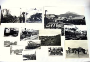 Collection of photographs (some packs with negatives), slides of trains and railway line extensions,