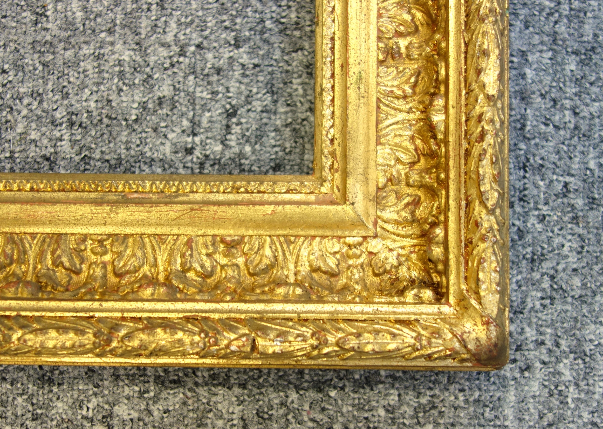 Victorian gilt moulded rectangular picture frame with floral decoration, rebate 77.3 x 64.4cm, 92. - Image 2 of 3