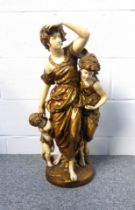 Late 19th Century Austrian plaster group of a woman with two children wearing gold costume, standing