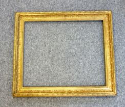 Victorian gilt moulded rectangular picture frame with floral decoration, rebate 77.3 x 64.4cm, 92.
