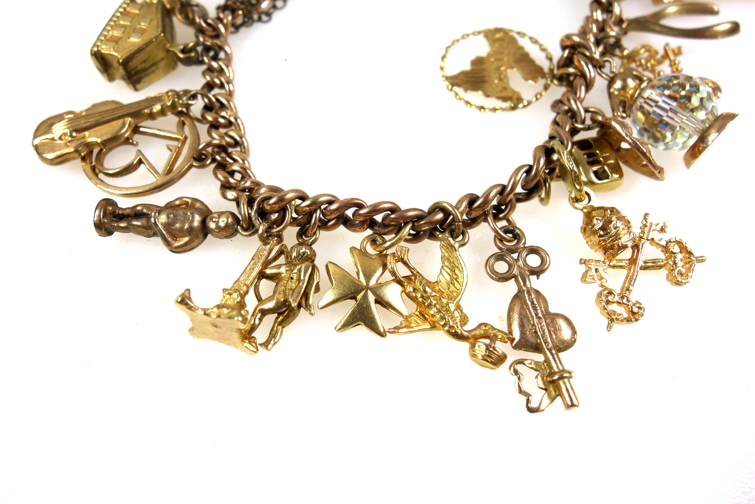 9ct gold charm bracelet with 27 charms, gross weight 44.2 grams - Image 3 of 5