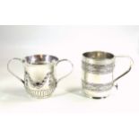 George III silver porringer with reeded twin strap handles, semi reeded body and embossed swag