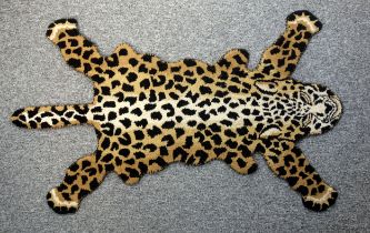 Shenkin hand-crafted Indian tufted wool rug, shaped as a leopard skin, 95 x 140cm.