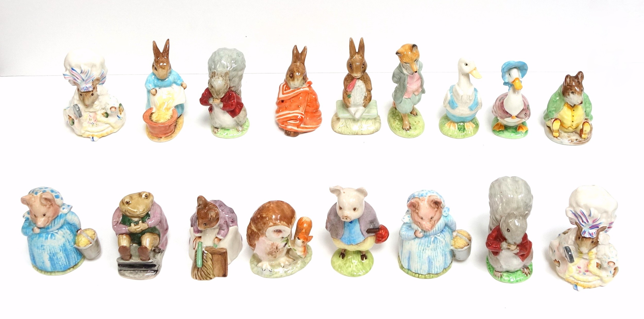 Seventeen Beswick models of Beatrix Potter characters, tallest H.12cm. (17)