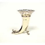 Edwardian silver cornucopia vase with a pierced floral rim, terminating in a dolphin mask, on 2